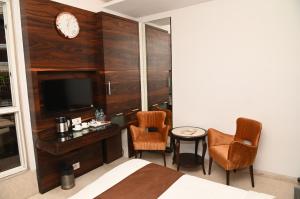 B Four Residency -Unit of Captial Tour and Travels