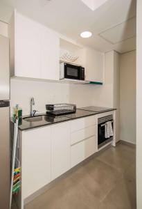 Modern Two-Bedroom in Luque with Pool and Gym Access