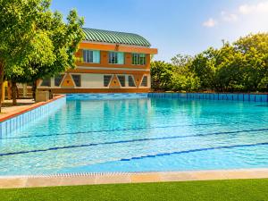 Palm Greens Club & Resort by The Sky Imperial