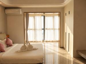 Wealth Mansion Condominium Hotel