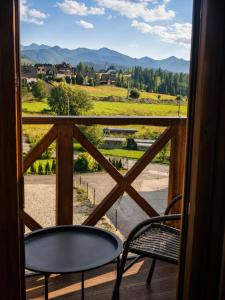 Hrube DOMKI Zakopane - klimatyczne domki z widokiem na Tatry