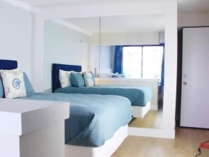 #210 Beachside One Bedroom and Two Bathroom Apartment with Full Kitchen
