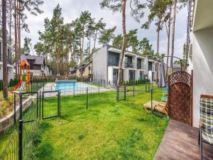 2-story holiday home with a garden and a pool