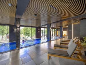 Holiday studio with balcony, indoor pool, sauna