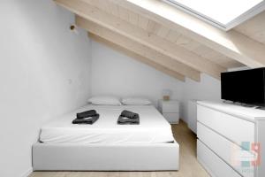 MO64 - Elegante Attico Duplex con 2 Bagni