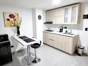 Modern studio, workspace, and full kitchen