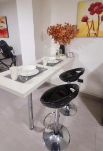 Modern studio, workspace, and full kitchen