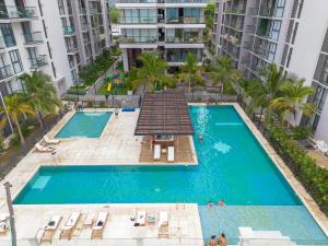 Apto Deluxe Vista al Mar Piscina y Playa a 300 m