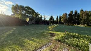 Ayres de Pilar house with a large park and mature trees.