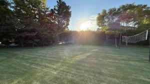 Ayres de Pilar house with a large park and mature trees.