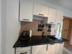 Holiday home with private garden, close to the sea