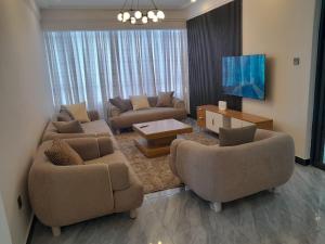 Beautifully furnished apartment with swimming pool ample parking space fully equipped gym child play area and amazing city views