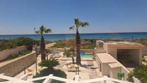Villadamuri on the beach
