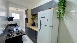Apartment Praia Grande Tupi 250 meters from the beach Garage