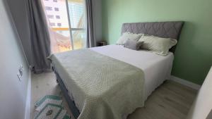 Apartment Praia Grande Tupi 250 meters from the beach Garage