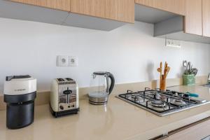 Skyline 3BR Apartment with Expansive Private Terrace - Families Only
