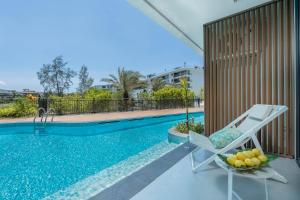 Modern Pool Access Condo At Beachfront Bang Tao Beach