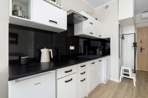 Funkcjonalne Studio z Klimatyzacją i Miejscem do Pracy by Noclegi Renters