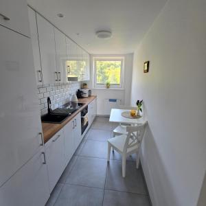 Słoneczny Apartament Panorama 5 7 z Widokiem na Jezioro i Góry