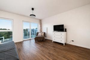 Luboń City Comfort Studio by BookingHost