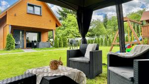 Domek rodzinny DREAM HOME bez tłumów, ogrzewany, taras, ogród z placem zabaw, free parking ogrodzony i zamykany
