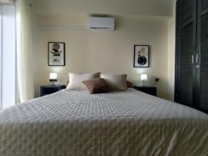 Appartement Élégant 2 Chambres, Balcon, Fibre, Climatiseur, IPTV & Parking privé à 5 min de la plage