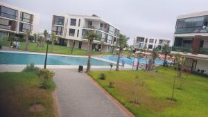 Appartement privée dans un domaine résidentiel sécurisé avec Piscine, Sports & Plage