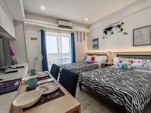 Condo Azur Suites A732, Amani Resorts Residences, 5 minutes Airport, Netflix, Stylish, Cozy with Luxurious Swimming Pool