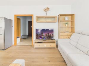 Wola CityView Apartment Balcony & Parking by Solarento