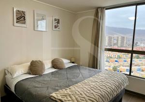 Característico departamento 2 habitaciones, capacidad 4 y 5 personas, excelente vista de la ciudad y mar