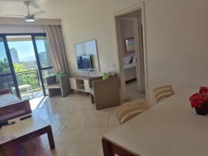 BARRA BELLA PRAIA RESIDENCE - Internet 550mb -TV -AR - Frente Praia - Piscina Climatizada -HomeOficce - Opção de Café da manhã