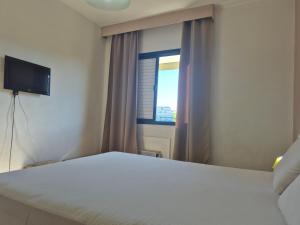 BARRA BELLA PRAIA RESIDENCE - Internet 550mb -TV -AR - Frente Praia - Piscina Climatizada -HomeOficce - Opção de Café da manhã