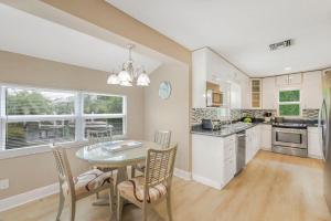 Pet-friendly two-story home with pool, spa, and grill
