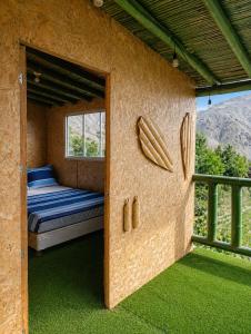 Rustic room with a view of the valley in Lunahuaná