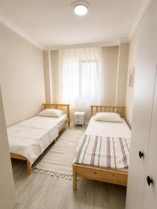 Luxury 2 plus 1 apartment with a unique view in the center of Ayvalık