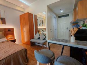 Condo Travelers Nest 211, Amani Resorts Residences, 5 minutes Airport, Netflix, Stylish, Cozy with Luxurious Swimming Pool