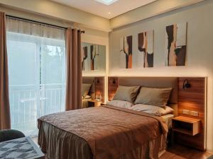 Condo Travelers Nest 211, Amani Resorts Residences, 5 minutes Airport, Netflix, Stylish, Cozy with Luxurious Swimming Pool