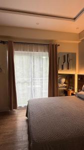 Condo Travelers Nest 211, Amani Resorts Residences, 5 minutes Airport, Netflix, Stylish, Cozy with Luxurious Swimming Pool