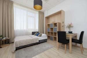 Cosy Studio with a Bath and Parking Space in Warsaw by Noclegi Renters