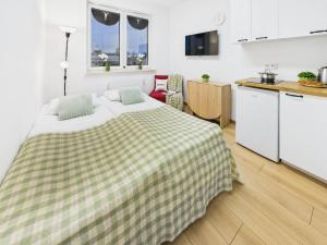 Budget-Friendly Studio Apartments Praga by Noclegi Renters