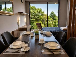 Modern Loft Studios and Rooftop & Country Club Views