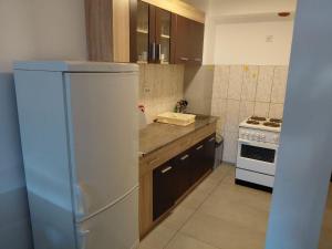 Defakto Apartment