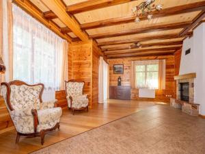 Comfortable holiday home with a fireplace