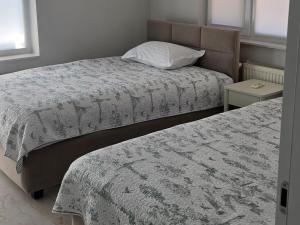 Cameră twin confortabilă și luminoasă