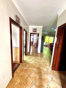 Charming Apartment with Balcony, Pool, Parking, and 2700m2 Garden