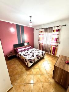 Charming Apartment with Balcony, Pool, Parking, and 2700m2 Garden
