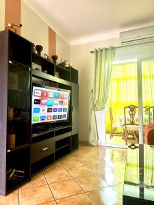Charming Apartment with Balcony, Pool, Parking, and 2700m2 Garden