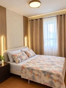 Davao Condo 2BR at Seawind With Netflix Fast Wi-Fi & Backup Wifi Near Airport and & Samal Island Ferry