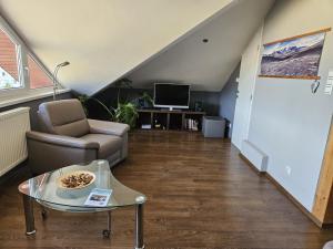 Quiet attic apartment in family house