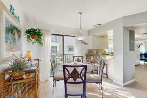 Charming condo with access to shared outdoor pool wifi & private balcony